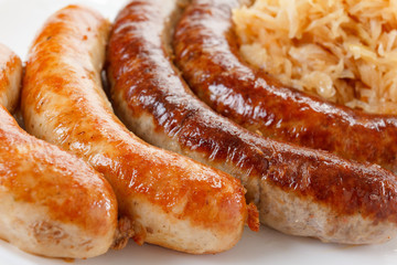 Oktoberfest menu, plate of sausages and sauerkraut