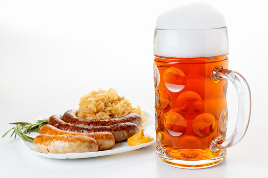 Oktoberfest menu, beer mug, a plate of sausages and sauerkraut