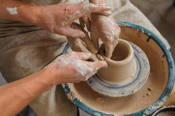 Potter teaches how make clay pot