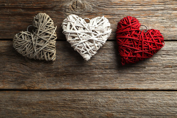 Love hearts on a grey wooden background