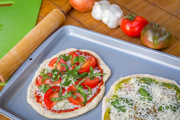 Freshly baked artisan pizza with fresh produce and cheese.