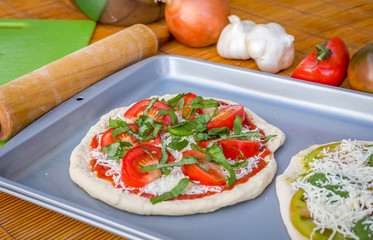 Freshly baked artisan pizza with fresh produce and cheese.