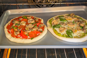 Freshly baked artisan pizza with fresh produce and cheese.
