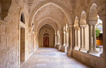 Fototapeta na wymiar Bethlehem - The gothic corridor of atrium at St. Catharine church.
