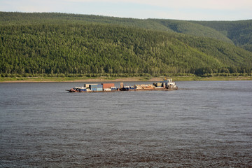 barge going down the river Lena