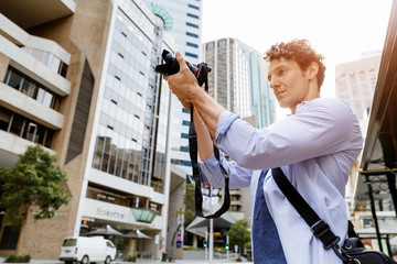 Male photographer taking picture