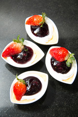  blueberry cheese cake in white cup.
