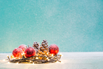 Christmas decorations with candles and pine corn