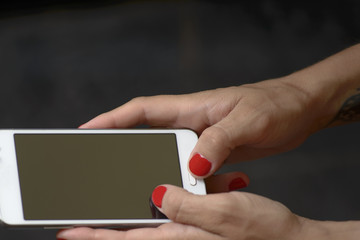 Cell Phone in Woman Hands, Sending Text Messages or Surfing the Web
