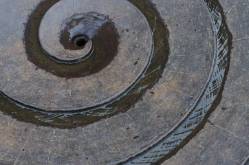 Water running around a fibonacci or golden spiral