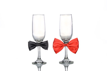 empty champagne glass with bow tie