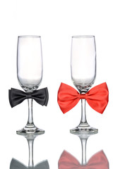 empty champagne glass with bow tie