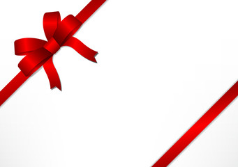 Red gift bows and ribbons on white gift box background