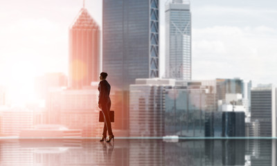 Businesswoman facing new day