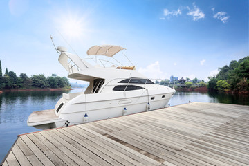 sun skyline and yacht along wooden floor