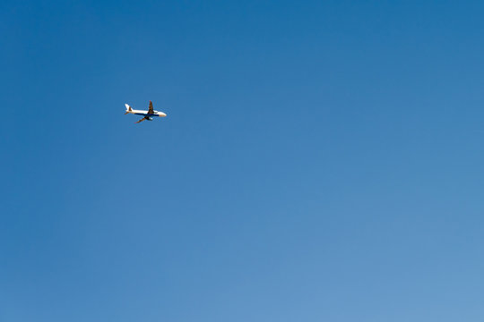 Fototapeta Airplane On Clear Blue Summer Sky