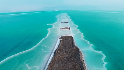 Aerial footage of The Dead sea Salt and mineral deposits