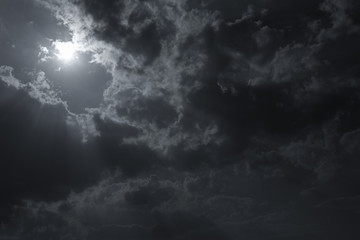 Obraz premium sunbeam through the clouds of sunlight in blue sky background