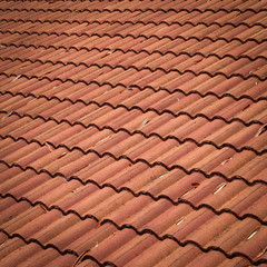 brown tile roof weathered on building residential