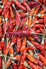 dry red chili on bamboo basket floor