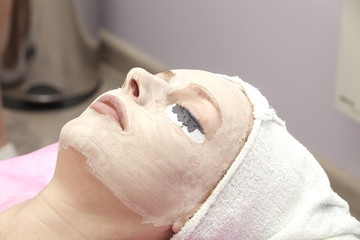 Fototapeta premium a woman wearing a mask