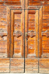 grain texture of a   antique   old door in italy   europe