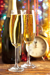 Happy new year - alarm clock and champagne