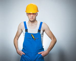 Frowning manual worker