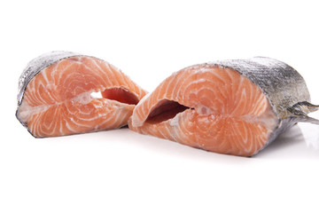 Two piece of fresh salmon with on a white background