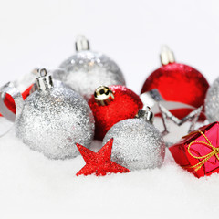 Christmas balls on snow