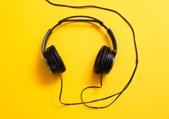 Headphones on yellow