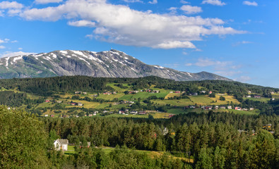 Fototapeta premium Scandinavian summer rural view from the hill