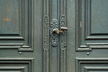 The black and old, wooden door