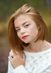 young beautiful girl with red hair
