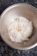 Fototapeta na wymiar dough in bowl for pizza and pasta