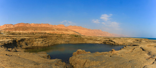 Dead sea coastline with sinkhole