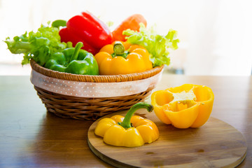 Healthy vegetable in basket put on wooden table