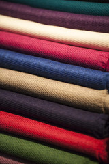 Colorful silk and wool scarfs in a market