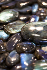 Texture of colorful labradorite gem stones.