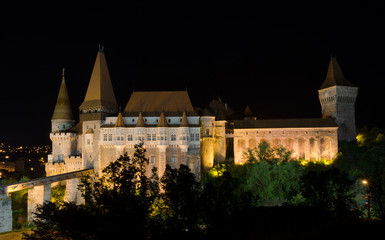 Corvin Castle panoramic view at night. The castle is situated in Hunedoara, Transylvania, Romania