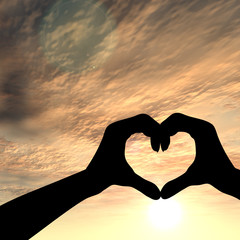 Fototapeta premium Conceptual heart shape sunset silhouette