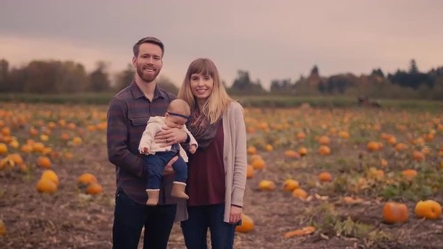Portrait of a family at a pumpkin patch