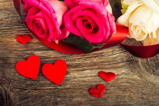 hearts and a  roses on wooden table, Valentines Day background