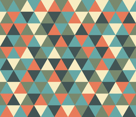 Seamless background pattern with abstract multicolored geometric shapes.
