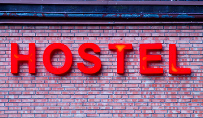 Obraz premium Sign of the hostel.