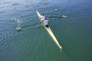 Two rowers in a boat