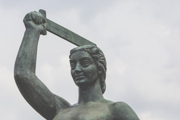The Warsaw Mermaid called Syrenka on the Vistula River bank in W © Curioso.Photography