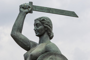 The Warsaw Mermaid called Syrenka on the Vistula River bank in W © Curioso.Photography