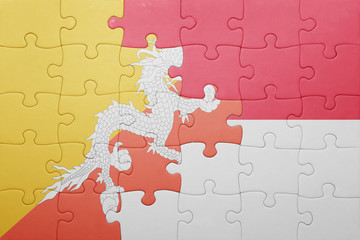 puzzle with the national flag of indonesia and bhutan