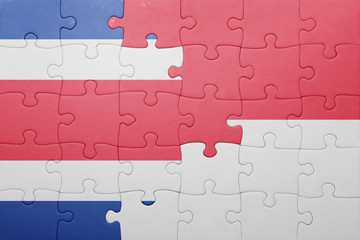 puzzle with the national flag of indonesia and costa rica